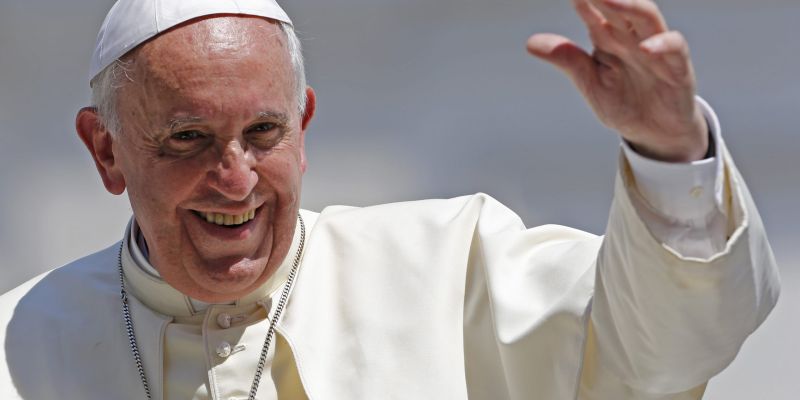 Pope Francis waves after leading his weekly general audience at St. Peter's Square at the Vatican