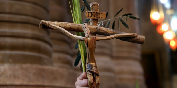 web-palm-sunday-cross-easter-c2a9gali-tibbon-afp