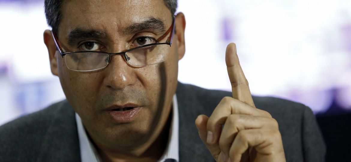 Venezuela's Interior and Justice Minister and intelligence service head Miguel Rodriguez Torres speaks during an interview with Reuters in Caracas