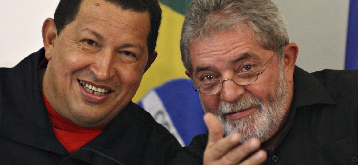 Brazil's President Lula and Venezuela's President Chavez smile during a ceremony in Salvador City