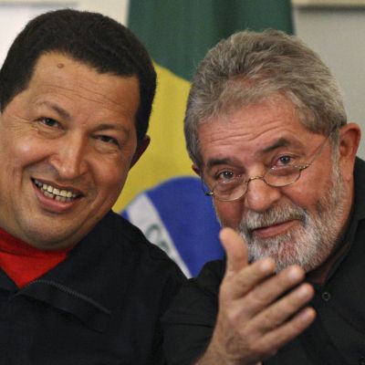 Brazil's President Lula and Venezuela's President Chavez smile during a ceremony in Salvador City