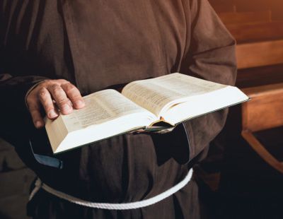 web3-franciscan-friars-brown-habit-friars-minor-priest-monk-bible-shutterstock