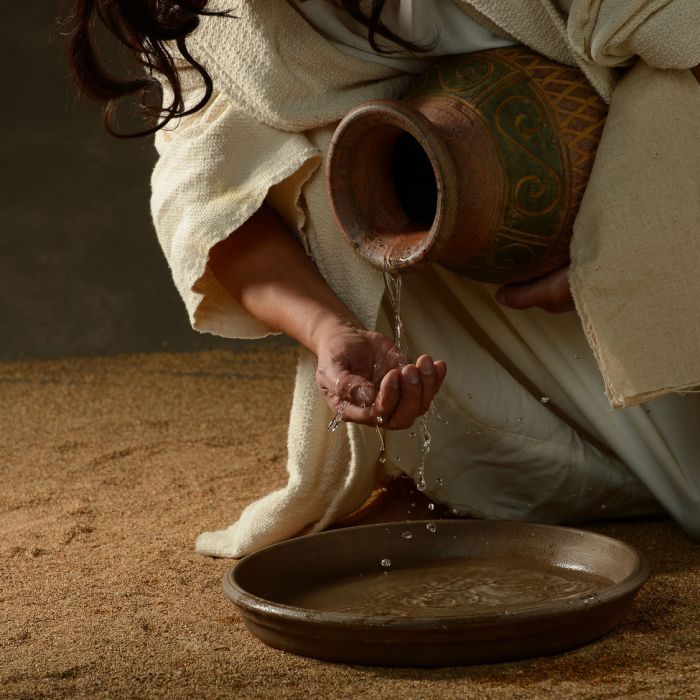 Jesus pouring water
